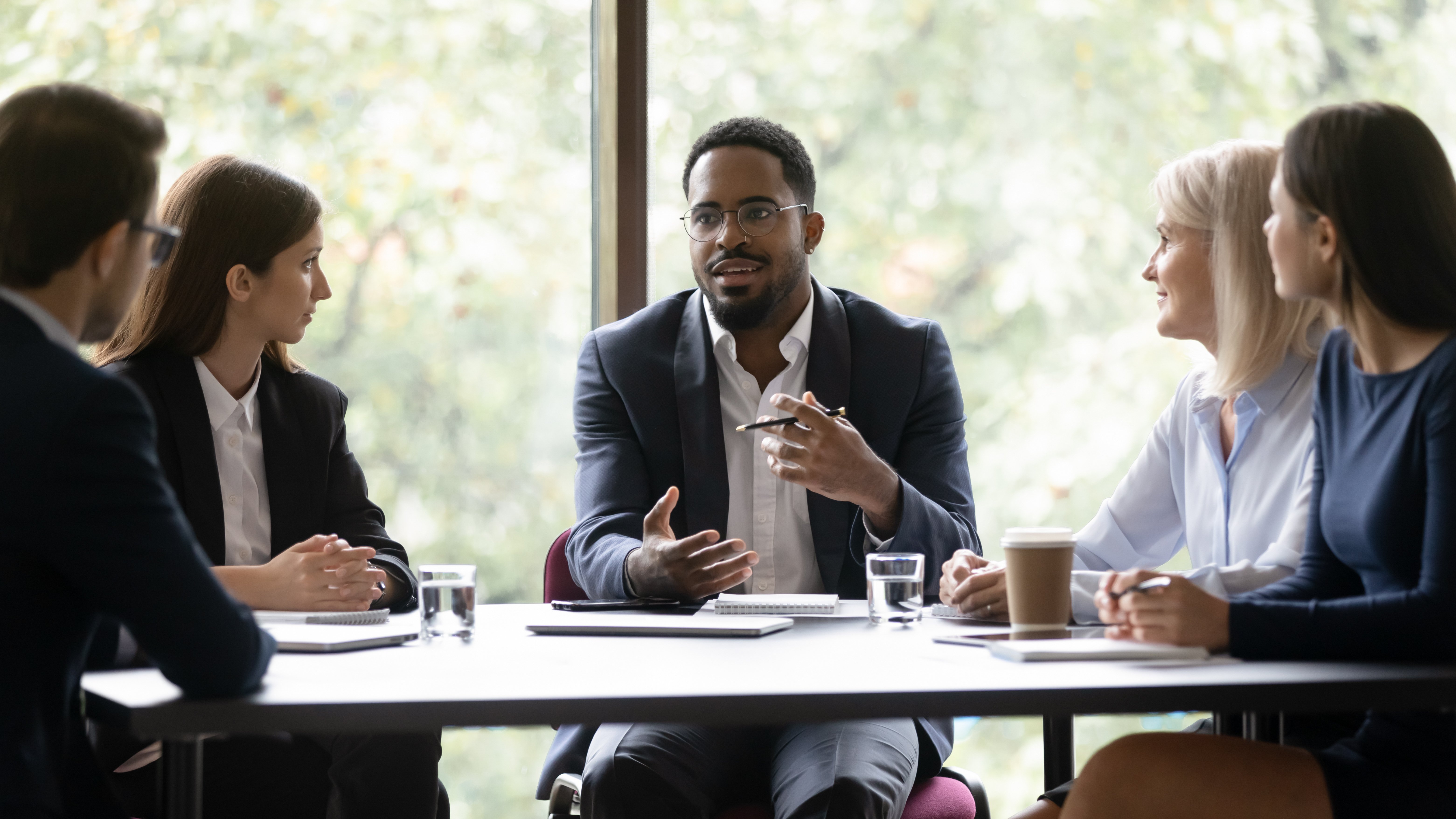 business-man-presenting-at-meeting-as_445856589